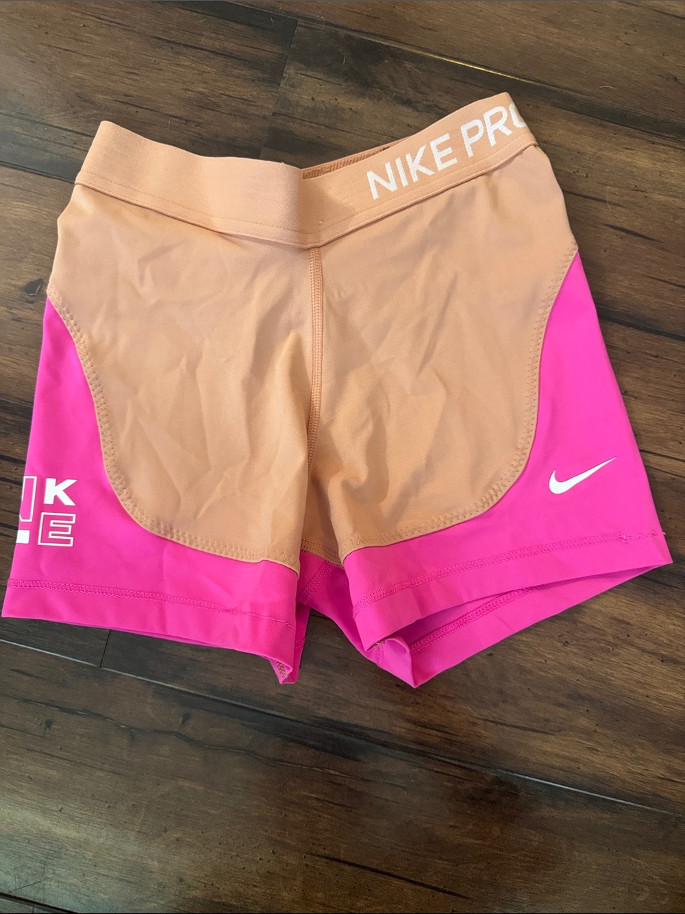 Nike Pro Colorblock Athletic Shorts in Pink and Tan